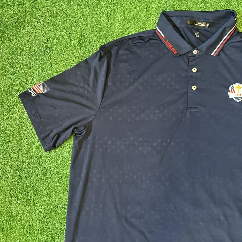 RLX Ralph Lauren Athletic Polo Shirt Mens 2XL Blue USA Open 2018 Patch Flag Logo
